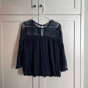 Small navy blue top from Anthropologie